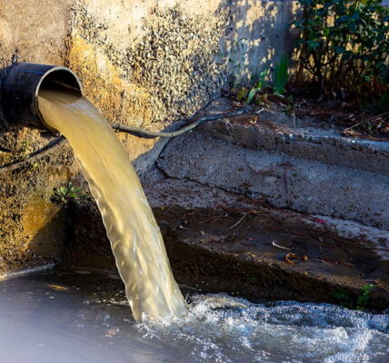 sewage pumping into a river contamination