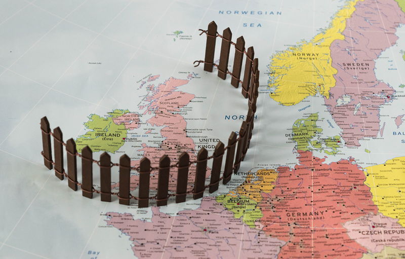 uk ringed off on a map with a fence brexit