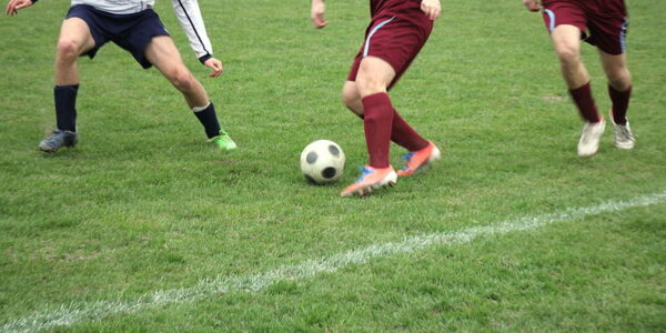 player turns on the ball in football match skills